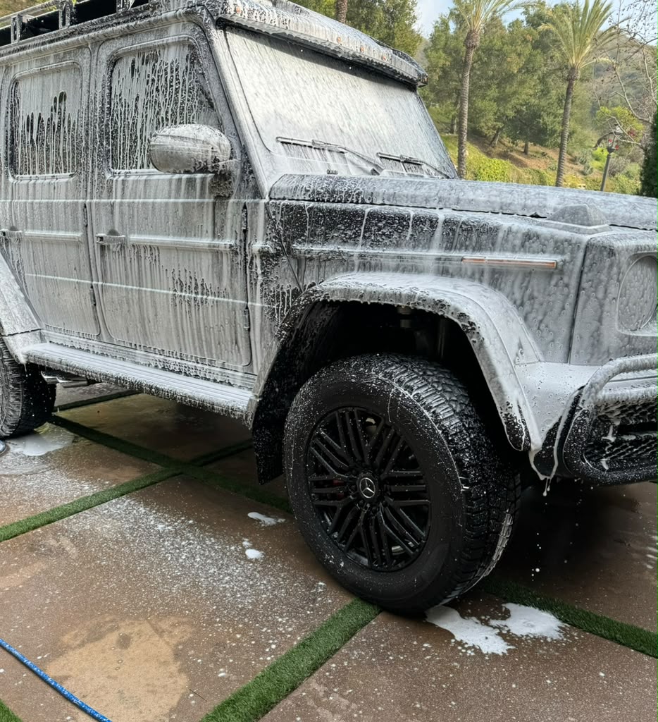 Tlacolulo mobile detailer foaming a Mercedes G-Wagon